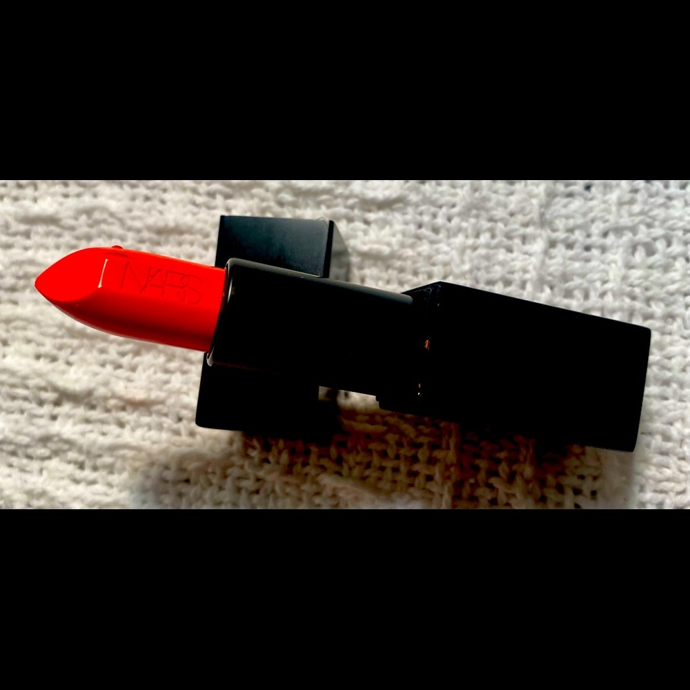 NWOT PERFECT never used NARS Audacious Lipstick in shade Nina. Stunning.